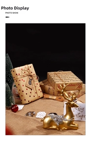 Macro detail of Christmas kraft gift wrapping paper set with reindeer tags and twine