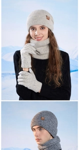 Winter knit set featuring ear-flap hat, scarf, and gloves with a leather logo detail