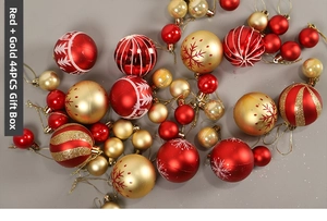 Detail of 44pcs red and gold Christmas ball set with matte, glitter and painted textures