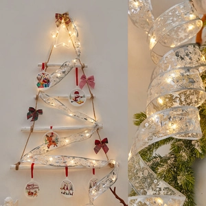 Silver Christmas ribbon lights with warm LED stars for tree and wall decorations