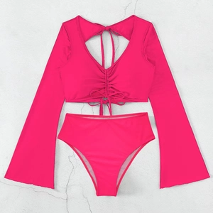 Detailed view of high-waist bikini bottoms and long-sleeve top with gathered tie detail