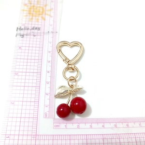 Sweet red cherry keychain with gold leaf charm and heart shaped lobster clasp pendant