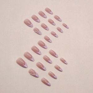 French almond press-on nails in nude and lavender with pearl accents, 24 piece set