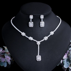 Elegant silver bridal jewelry set with sparkling rectangular zircon necklace and earrings