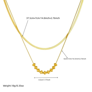 Double layered gold plated stainless steel necklace featuring snake chain and beaded pendant