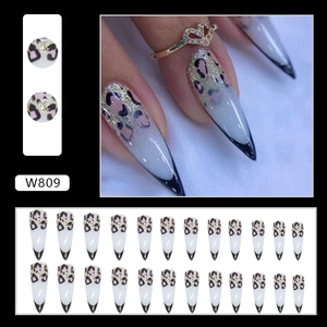 Long stiletto black French nails with leopard print and glitter, 24pcs press-on nail kit