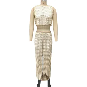 Sleeveless crop top and floral maxi skirt two-piece set in elegant cream mesh