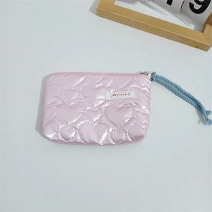 Close-up of pink heart-quilted PU pouch with Mayrabbit label and blue lanyard strap
