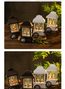 Detailed view of LED lighted Christmas snow globe street cart with Santa and Snowman scenes