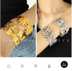 Detailed view of hollow leaf and floral titanium steel bracelets in gold and silver finish