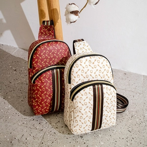 Retro equestrian print chest bag with horsebit pattern and striped webbing strap