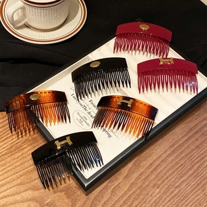 Vintage acrylic geometric oval H-letter hair pins and combs set in tortoiseshell and black