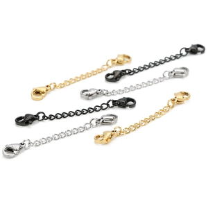Three colors of stainless steel curb chains with lobster clasps on a white background