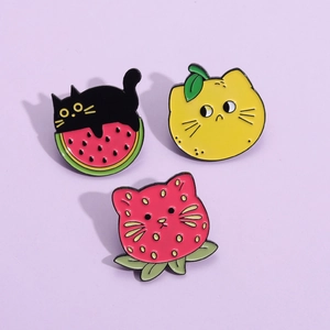 Creative fruit cat enamel pin set featuring watermelon, lemon, and strawberry designs