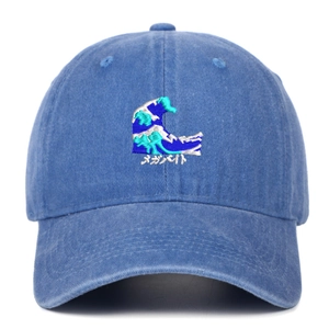 Close-up of Japanese wave embroidery and texture on washed cotton baseball cap