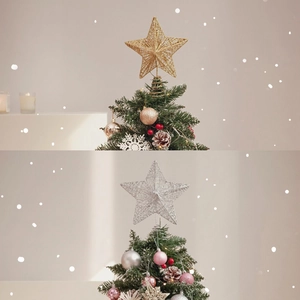 Golden and silver hollow tree topper stars on decorated Christmas trees with snow effects