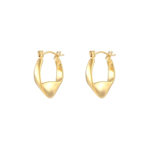 Macro detail of gold twisted hoop earrings with a polished finish on white background