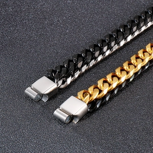 Detail of double-layer Cuban chain bracelets with magnetic clasps in gold and silver