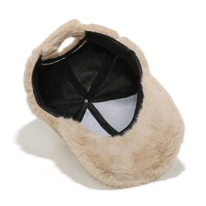 Detailed view of the plush faux fur texture and reinforced inner lining of this warm baseball cap