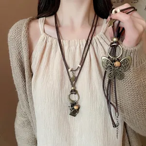 Vintage Long Pendant Necklace Alloy Butterfly Camera Star Wood Beads Wax Rope Bohemian Forest Style Jewelry Women