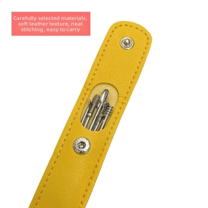 Portable stainless steel ear pick set with yellow leather storage case and metal snap button