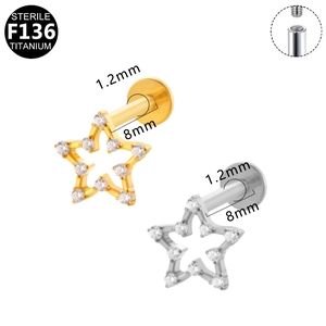 Star-shaped F136 titanium labret studs with zircon in gold and silver finishes