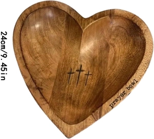 Close-up of a 24cm heart-shaped wooden prayer bowl with engraved crosses and text detail
