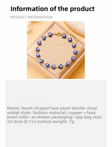 Detail view of Evil Eye heart charm anklet with gold chain and lobster clasp closure