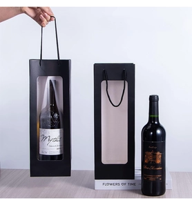 Detail of black wine gift bag with clear window for single bottle packaging