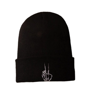 Unisex black knitted beanie hat with white bone hand gesture embroidery on the front cuff