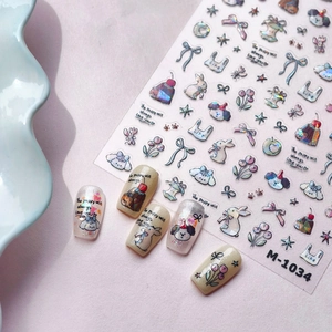3D cartoon nail art stickers with glitter puppy and rabbit patterns on light pink background