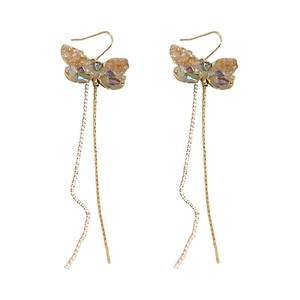 Elegant gold butterfly tassel earrings with colorful crystal inlay on white background