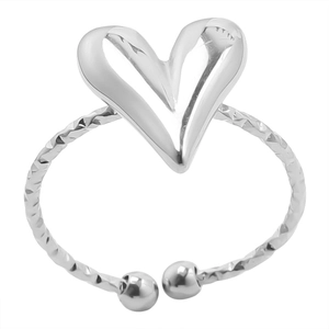 Detail of silver heart-shaped open ring featuring faceted texture and smooth metal beads