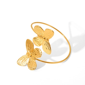 Elegant gold butterfly open bangle in stainless steel with a high-polished metallic finish