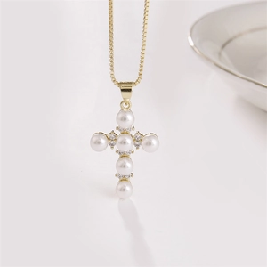 Golden cross pendant necklace with white pearls and sparkling cubic zirconia stones