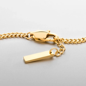 High-quality gold stainless steel Cuban link bracelet featuring a secure lobster clasp