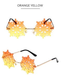 Detailed views of orange yellow snowflake shaped rimless sunglasses with metal frame
