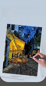 Macro shot of Van Gogh Cafe Terrace scratch art paper with specialized metal stylus tool