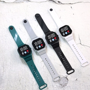 Detail view of colorful LED digital watches with astronaut icons and silicone straps