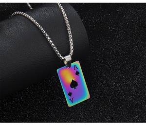 Close-up of rainbow gradient Ace of Spades card pendant with silver box chain