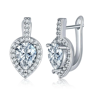 Detail of silver U-shaped hoop earrings with pear-cut cubic zirconia and pavé setting