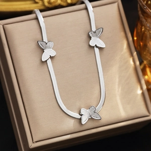Silver stainless steel snake chain necklace featuring three delicate 3D butterfly pendants