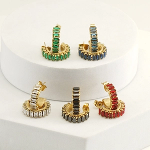 Detailed set of C-shaped 18K gold-plated steel earrings with vibrant baguette crystals