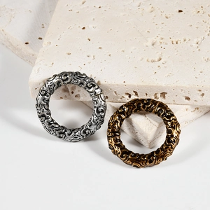 Fashion stainless steel round hoop earrings with textured finish in gold and silver