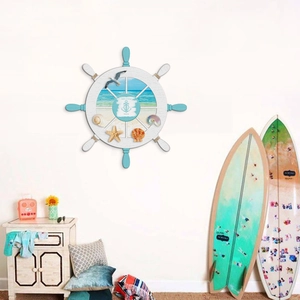 Mediterranean nautical ship wheel wall decor with starfish, seashells and beach scenery