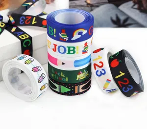 Close-up of Back to School ribbons with pencils, apples, and school bus patterns