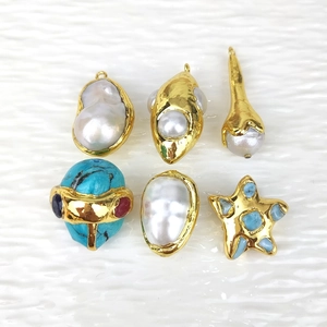 Detailed selection of irregular natural freshwater pearls and turquoise charms with gold plating