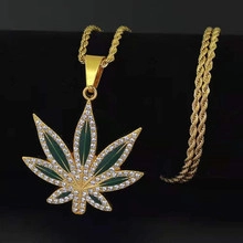Hip-hop style gold hemp leaf pendant with green oil drop and white rhinestones detail