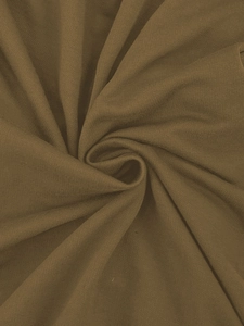 Detail of brown breathable knitted cotton fabric with soft texture for summer men's shorts
