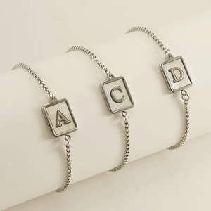 Elegant silver stainless steel box chain bracelet with white shell initial pendants